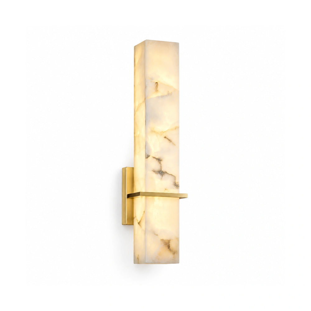 Solenne natural alabaster wall sconce in three-quarter view on a white background
