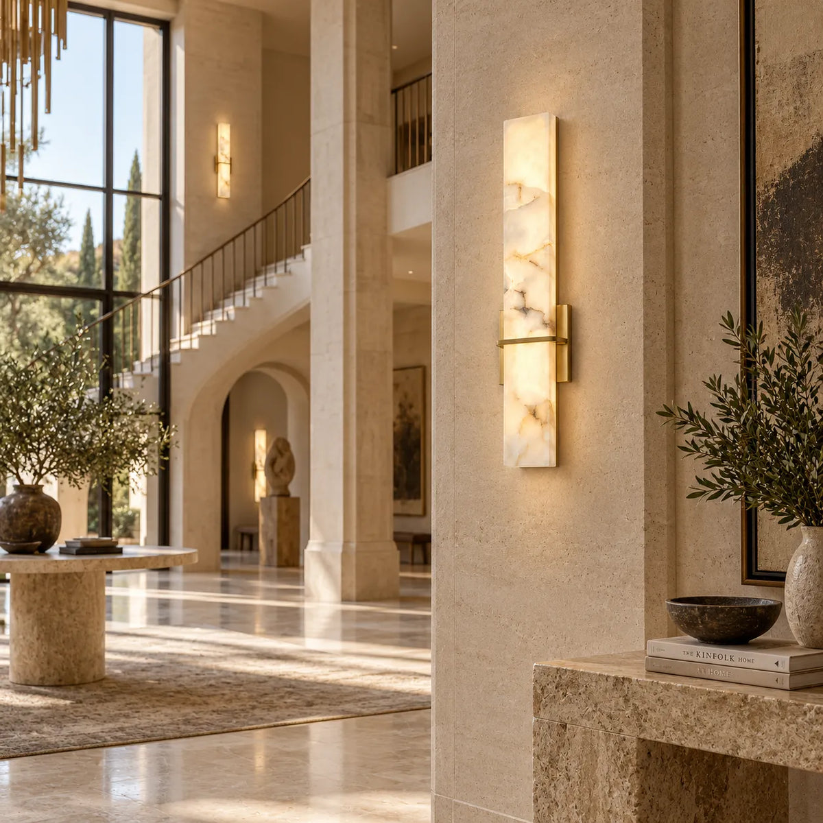 Solenne natural alabaster wall sconce in a grand villa hall
