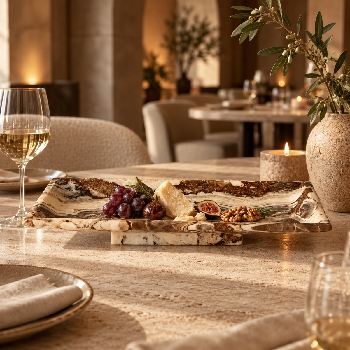 Tiramisu Strata stone tray styled in a refined architectural interior