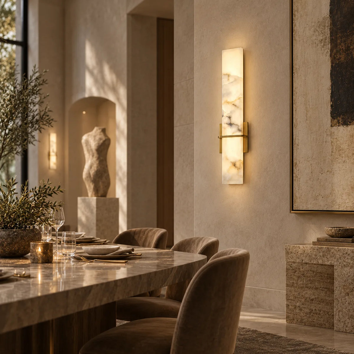 Solenne natural alabaster wall sconce in a gallery dining room