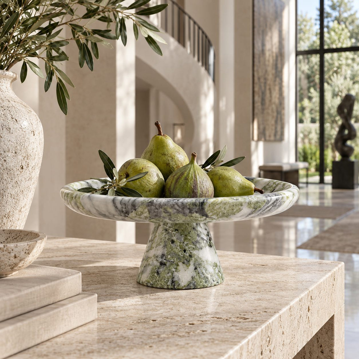 Verdant Relic natural stone pedestal tray in a gallery interior
