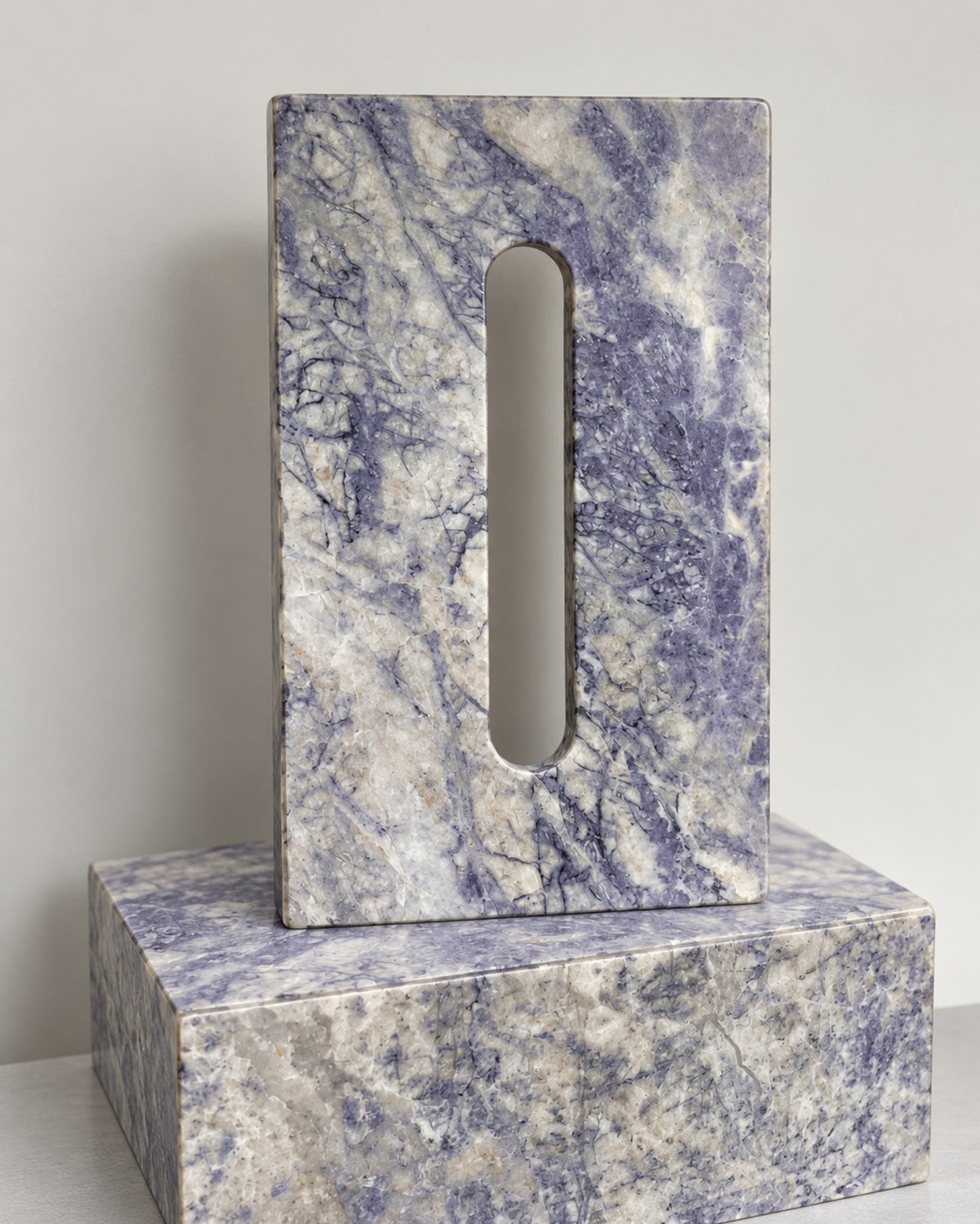 Lavender Mist natural stone wide surface view with pearl white, cool grey and restrained lavender mineral movement.