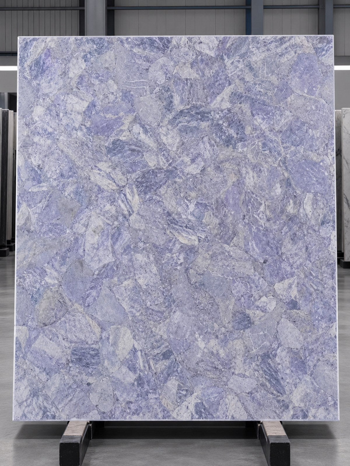 Vertical Lavender Mist natural stone study showing mineral variation and cool lavender-grey tones.